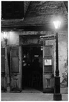 Cafe on Bourbon street at night, French Quarter. New Orleans, Louisiana, USA (black and white)