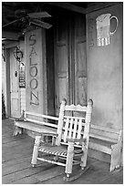 Rocking chair on saloon porch, Natchez under-the-hill. Natchez, Mississippi, USA (black and white)