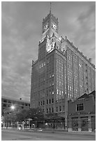 Art Deco building with clock tower at dusk. Jackson, Mississippi, USA (black and white)