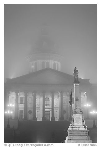 Monument and state capitol in fog at night. Columbia, South Carolina, USA (black and white)