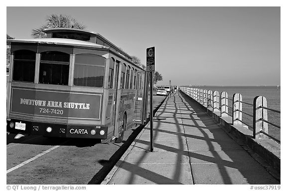 Waterfront promenade with shuttle bus. Charleston, South Carolina, USA (black and white)