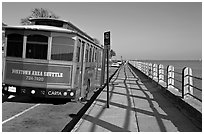 Waterfront promenade with shuttle bus. Charleston, South Carolina, USA (black and white)