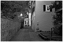 Alley at dusk. Charleston, South Carolina, USA (black and white)