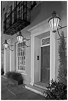 House facade with gas lamps. Charleston, South Carolina, USA (black and white)