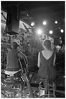 Singers from behind scene at Tootsie Orchid Lounge. Nashville, Tennessee, USA (black and white)