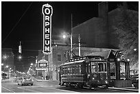 Street by night with trolley and Orpheum theater. Memphis, Tennessee, USA ( black and white)