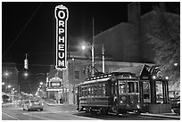 Street by night with trolley and Orpheum theater. Memphis, Tennessee, USA (black and white)