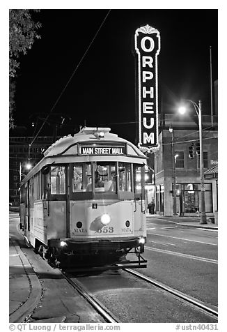 Trolley and Orpheum theater sign by night. Memphis, Tennessee, USA