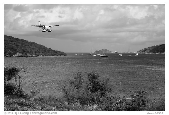 Floatplane approaching Charlotte Amalie harbor. Saint Thomas, US Virgin Islands (black and white)