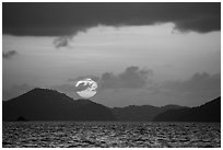 Sun setting over St Thomas island. Saint John, US Virgin Islands ( black and white)