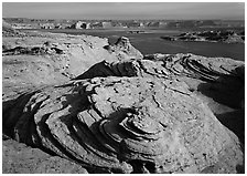 Sandstone Swirls and Lake Powell, Glenn Canyon National Recreation Area, morning. USA ( black and white)