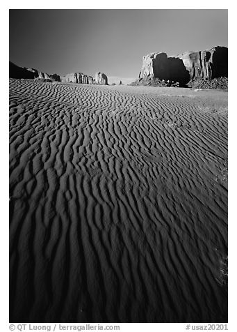 Ripples on sand dunes and mesas, late afternoon. Monument Valley Tribal Park, Navajo Nation, Arizona and Utah, USA