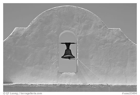 Bell and whitewashed wall, San Xavier del Bac Mission. Tucson, Arizona, USA