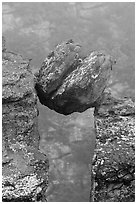 Spherical boulder stuck between pillars. Chiricahua National Monument, Arizona, USA (black and white)