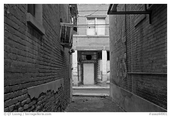 Alley and boarded-up store, Clifton. Arizona, USA