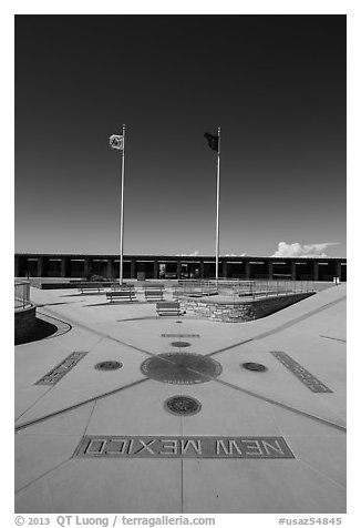 Disks, seals, and flags. Four Corners Monument, Arizona, USA (black and white)