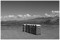 Portable toilets in desert. Four Corners Monument, Arizona, USA (black and white)