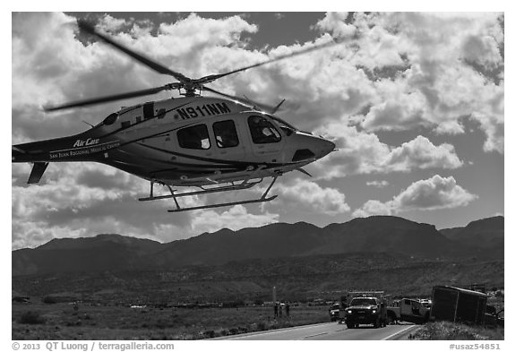 Helicopter at road accident site. Four Corners Monument, Arizona, USA (black and white)