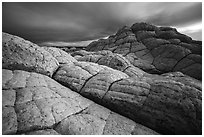 Buttes with crossbeded white sandstone layer, evening. Vermilion Cliffs National Monument, Arizona, USA ( black and white)