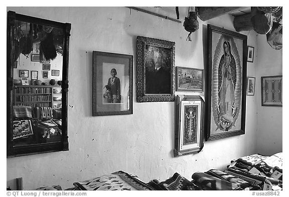 Wall with portraits from the Hubbel family. Hubbell Trading Post National Historical Site, Arizona, USA (black and white)