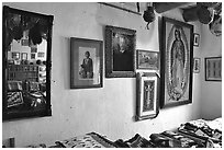 Wall with portraits from the Hubbel family. Hubbell Trading Post National Historical Site, Arizona, USA ( black and white)