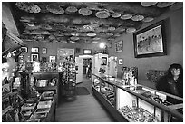 Room with baskets and jewelry for sale. Hubbell Trading Post National Historical Site, Arizona, USA ( black and white)