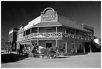 Horse carriage and saloon, Old Tucson Studios. Tucson, Arizona, USA (black and white)