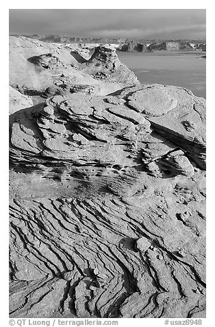 Sandstone Swirls and Lake Powell, Glen Canyon National Recreation Area, morning, Glen Canyon National Recreation Area, Arizona. USA