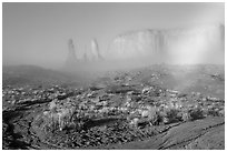 Three sisters, clearing fog, morning. Monument Valley Tribal Park, Navajo Nation, Arizona and Utah, USA ( black and white)