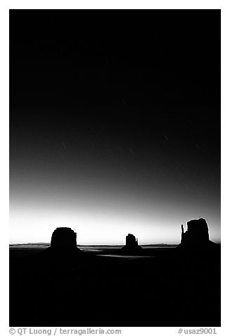 Buttes at dawn with short start trails. Monument Valley Tribal Park, Navajo Nation, Arizona and Utah, USA (black and white)