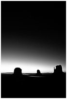 Buttes at dawn with short start trails. Monument Valley Tribal Park, Navajo Nation, Arizona and Utah, USA (black and white)