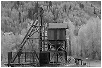 Mining structure and hillside with aspens. Colorado, USA (black and white)