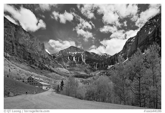 Road, aspens and Ajax peak in spring. Telluride, Colorado, USA