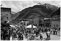 Crowds gather on main street during ice-cream social. Telluride, Colorado, USA (black and white)
