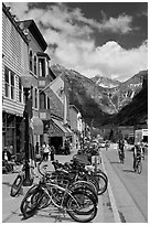 Mountain bikes parked on main street sidewalk. Telluride, Colorado, USA ( black and white)