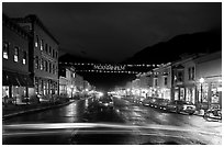 Colorado Street by night with Mountainfilm banner. Telluride, Colorado, USA (black and white)