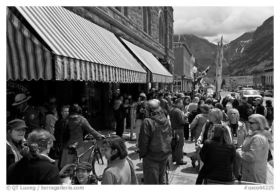 People gathering in front of movie theater. Telluride, Colorado, USA (black and white)