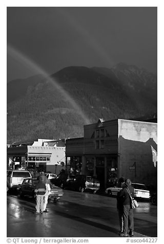People watching double rainbow on main street. Telluride, Colorado, USA (black and white)
