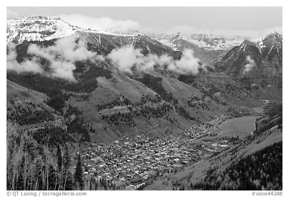 Box canyon surrounded by snowy mountains in spring. Telluride, Colorado, USA