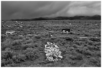 Grave made of loose stones, Villa Grove. Colorado, USA (black and white)