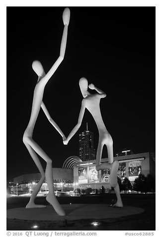 Sculpture framing Center for Performing Arts at night. Denver, Colorado, USA (black and white)