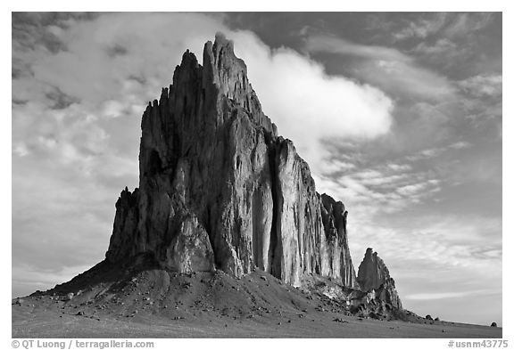 Shiprock with top embraced by cloud. Shiprock, New Mexico, USA (black and white)