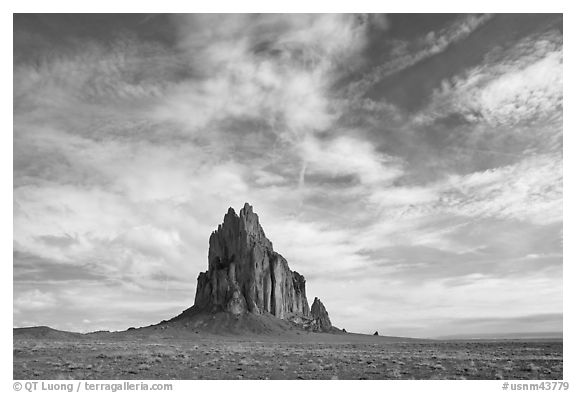 Shiprock volcanic plug raising above plain. Shiprock, New Mexico, USA (black and white)