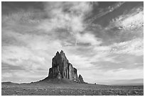 Shiprock volcanic plug raising above plain. Shiprock, New Mexico, USA ( black and white)