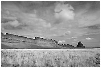 Serrated volcanic ridge leading to Shiprock. Shiprock, New Mexico, USA ( black and white)