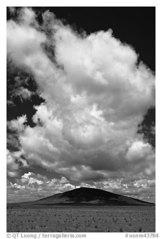 Afternoon cloud above hill. New Mexico, USA (black and white)