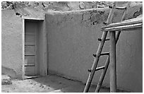 Blue door and ladder. Taos, New Mexico, USA (black and white)