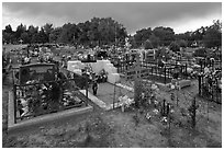 Cemetery with fenced graves. Taos, New Mexico, USA (black and white)