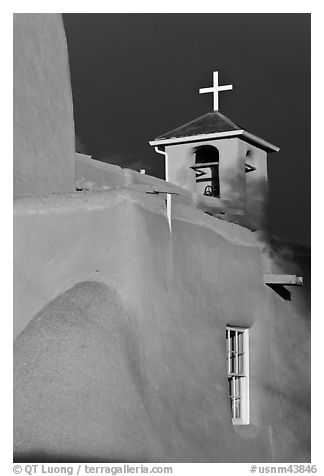 San Francisco de Asisis church under stormy sky. Taos, New Mexico, USA