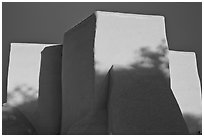 Massive adobe walls and buttresses of San Francisco de Asisis church, Rancho de Taos. Taos, New Mexico, USA ( black and white)